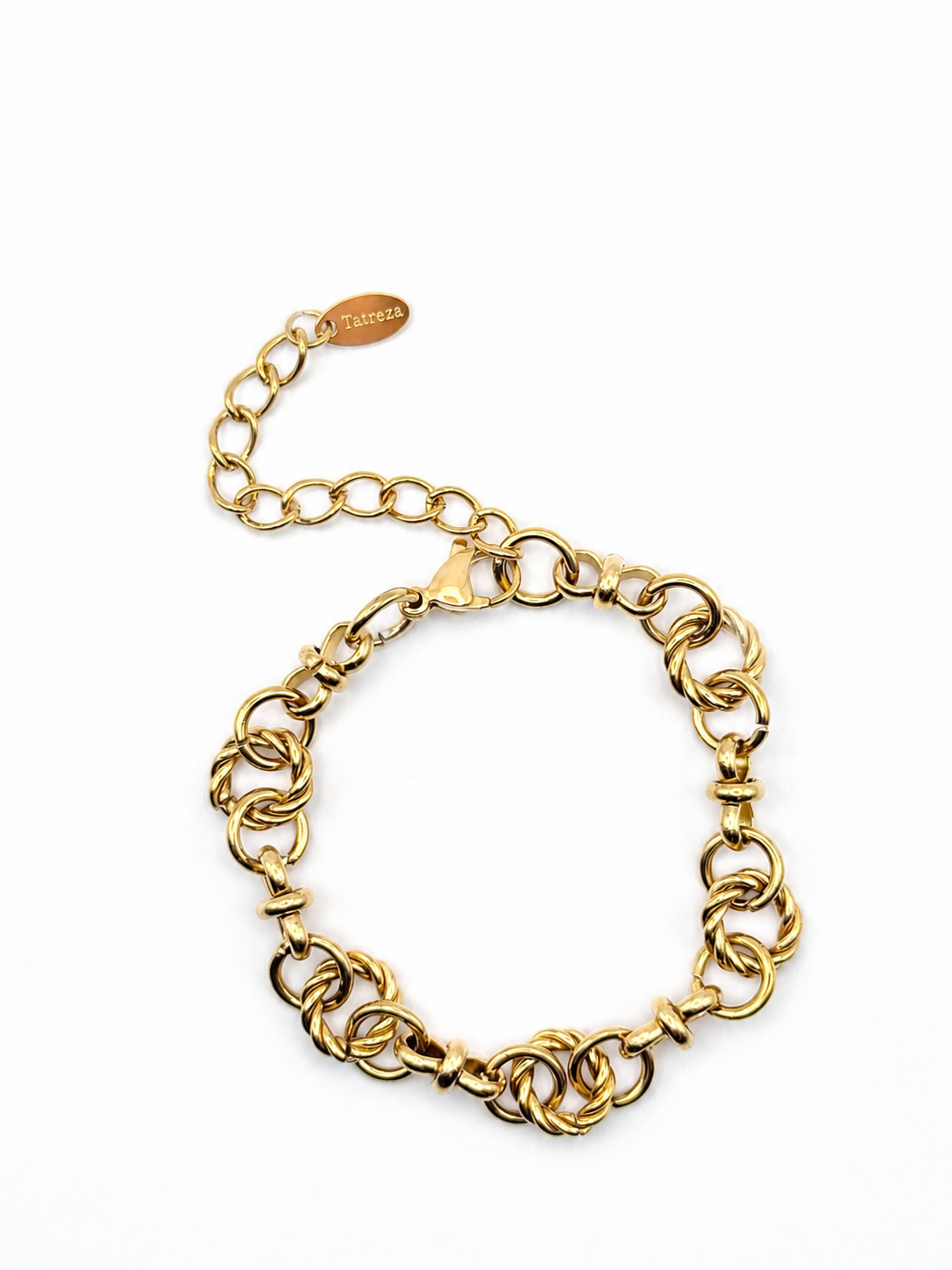 A gold-toned metal chain bracelet with a lobster clasp and an adjustable extender chain featuring a small branded tag, shown on a plain white background.